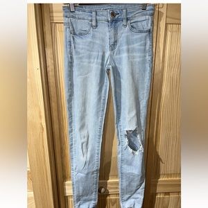 AMERICAN EAGLE Light Wash Jegging Distressed Size 0 LONG